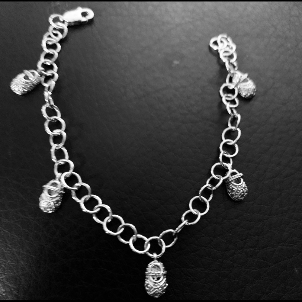 Silver baby shoes charm bracelet